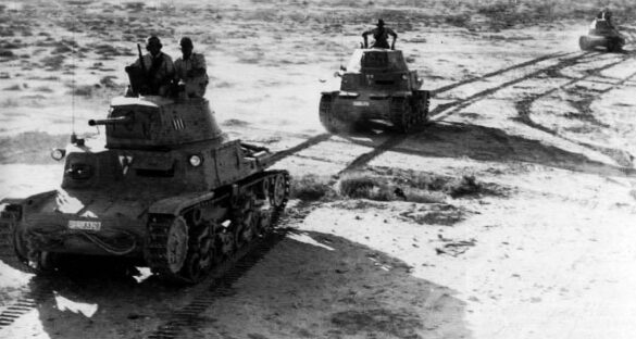 Una colonna di M13 ed M14 avanza in linea di fila in marcia nel deserto libico.