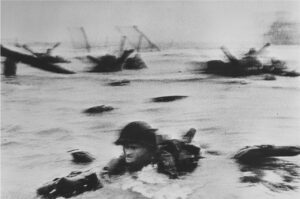 Robert Capa, [American soldiers landing on Omaha Beach, D-Day, Normandy, France], June 6, 1944.